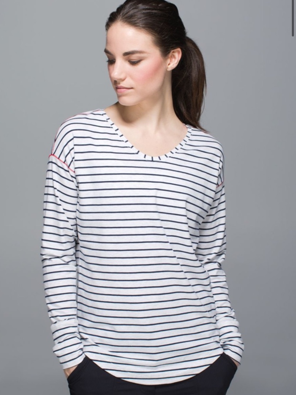 Lululemon women’s weekend long sleeve with thumbholes in light grey with stripes